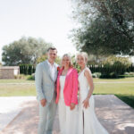 Luxury destination wedding planner with bride and groom during a wedding in Mallorca