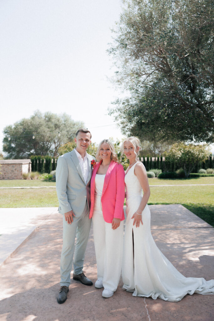 Luxury destination wedding planner with bride and groom during a wedding in Mallorca