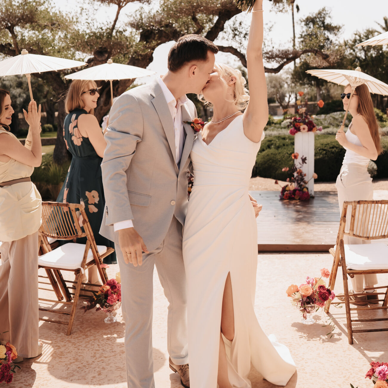 Wedding DJ and ceremony officiant creating an emotional and lively atmosphere for a luxury destination wedding in Europe.