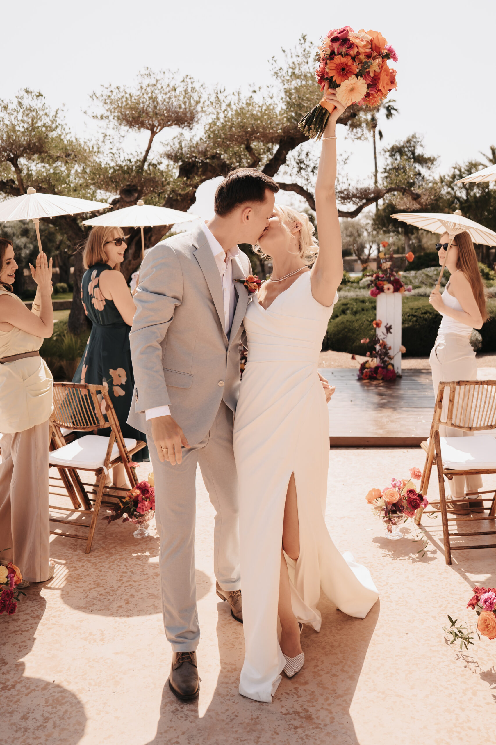 Wedding DJ and ceremony officiant creating an emotional and lively atmosphere for a luxury destination wedding in Europe.