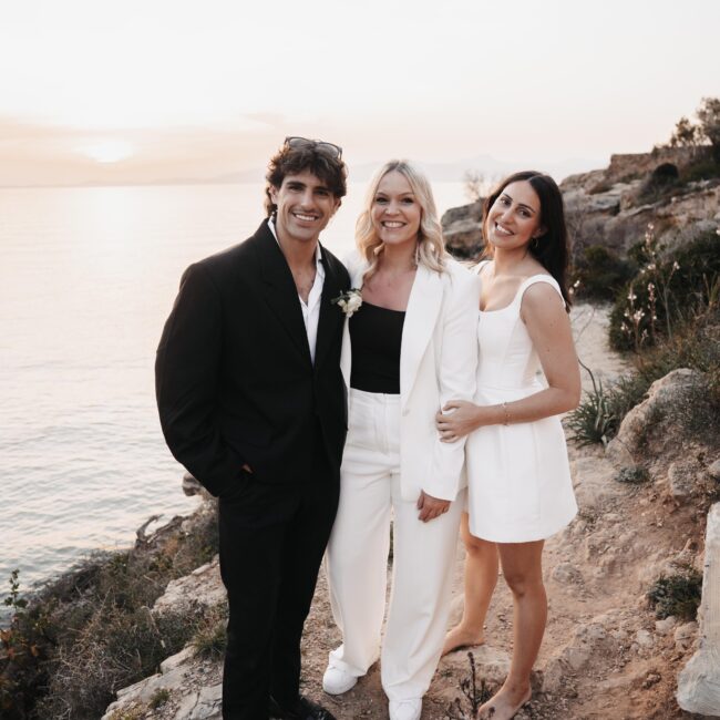 Wedding planner with bride and groom on their wedding day at a destination wedding in Europe, supporting and coordinating the celebration.